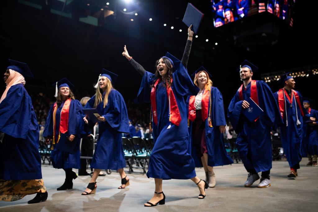 MSU Graduates celebrating during commencement