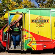 Fetien Gebre-Michael operating a food truck.